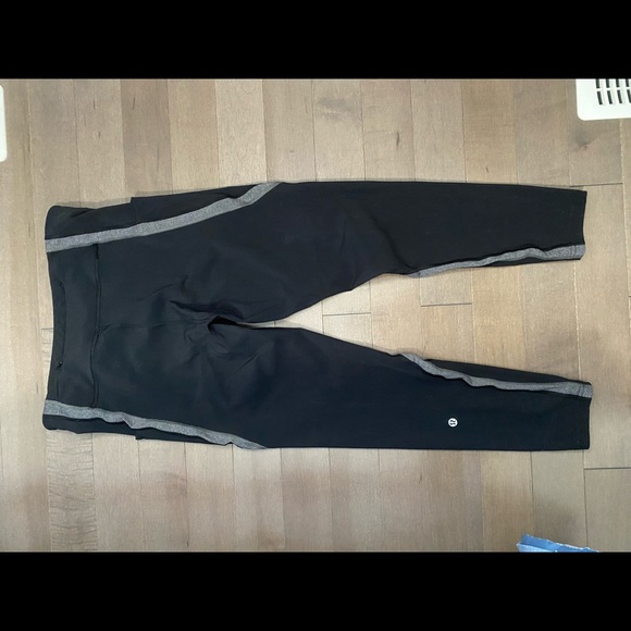 Lululemon leggings with side and back pockets. Size 10 black with gray design. - Picture 7 of 9